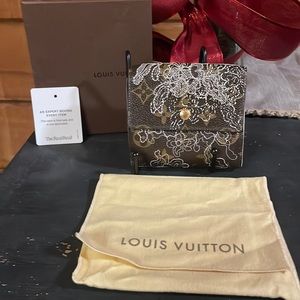 Louis Vuitton special ed monogram compact wallet. Serial#SP1007.